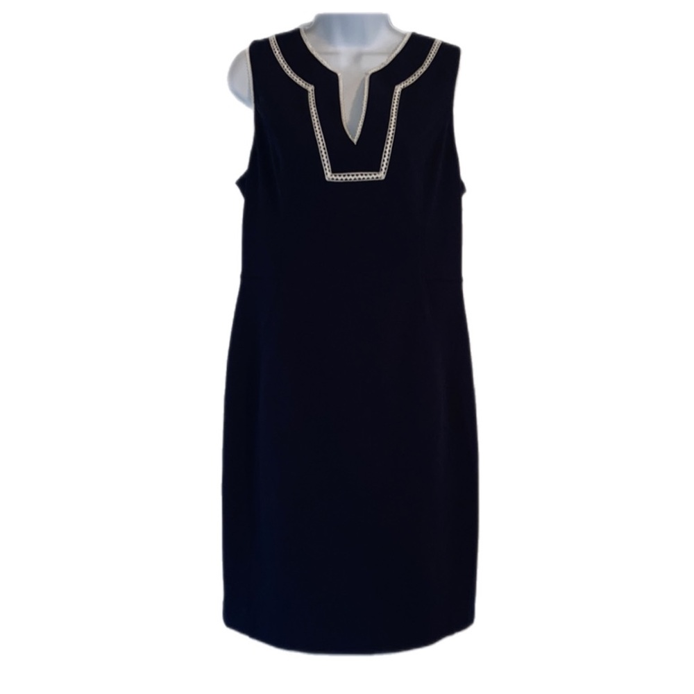 TH embroidery around the top shift dress.